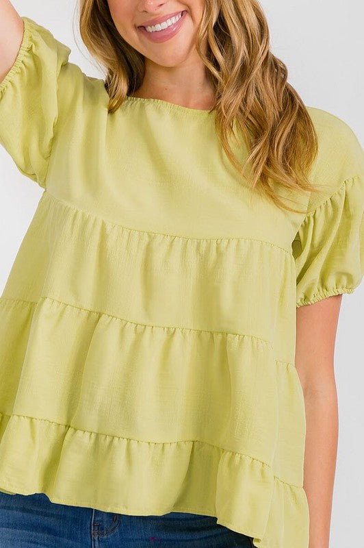 Short sleeves tiered high low. Blouse