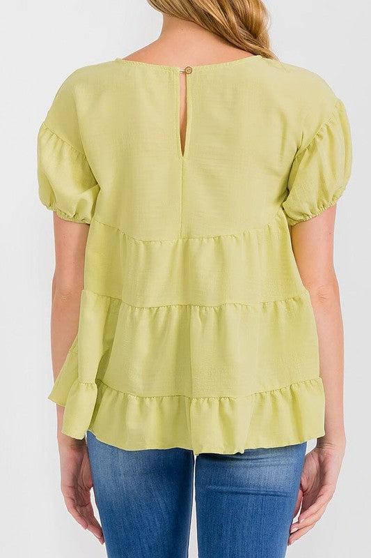 Short sleeves tiered high low. Blouse